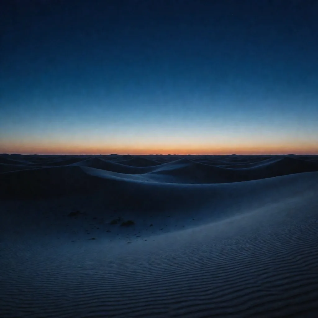 Desert landscape at dusk with deep blue tones